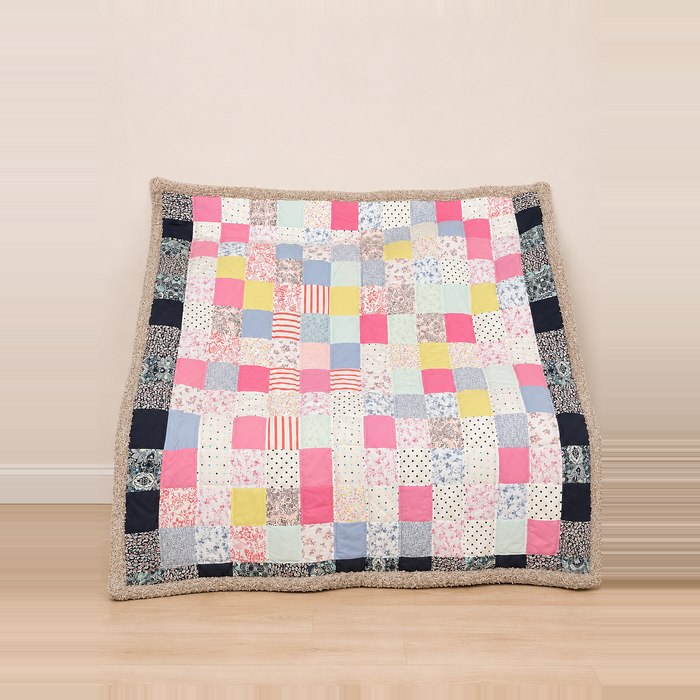 Patchwork memory blanket made from a loved one's clothing