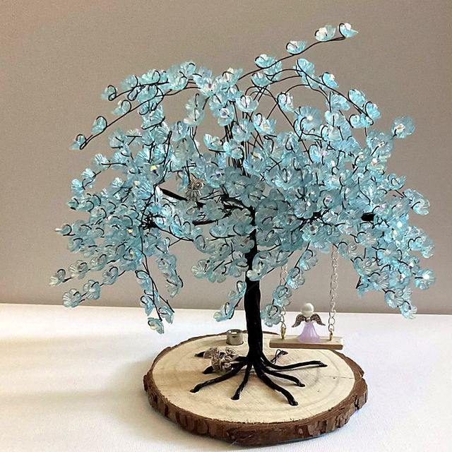 Memory tree with black wire and aqua blue blossoms