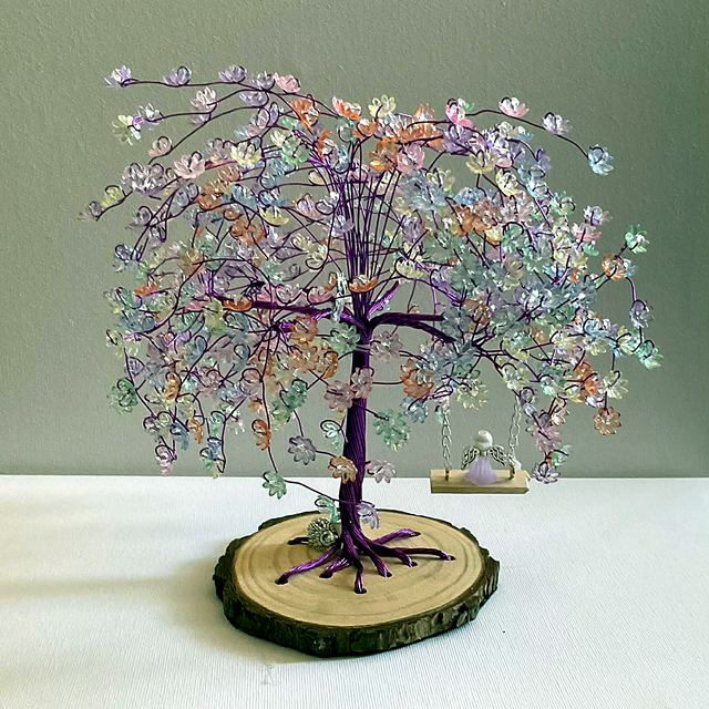 Memory tree with purple wire and iridescent pastel blossoms